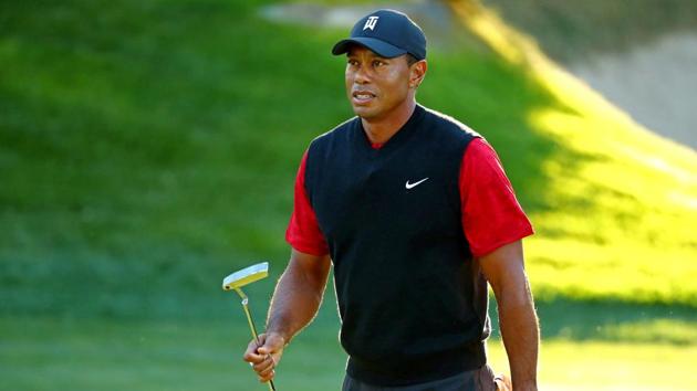 FILE PHOTO: Tiger Woods reacts to his putt on the 14th green during a match.(USA TODAY Sports)