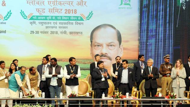 Chief minister Raghubar Das ,union agriculture minister Radha Mohan Singh and others launching ground breaking with 50 companied on food processing during the "Global Agriculture and Food Summit 2018" at Mega sports complex in Ranchi(Diwakar Prasad/ Hindustan Times)