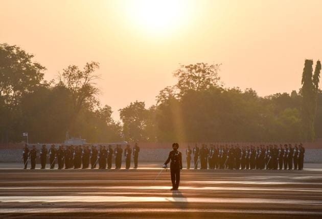 Squadrons come up in a formation on the inspection line at Khetarpal parade ground on the passing out parade of the 135th course of National Defence Academy on Friday. (SANKET WANKHADE/HT PHOTO) 