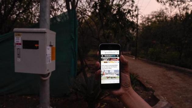 An HT reporter tries to access free WiFi installed by PMC on February 2, 2018 at some parts of Pashan lake garden. Pune smart city development corporation Ltd (PSCDCL) has requested permission from the Pune municipal corporation (PMC) for the digging work in 38 locations in the city for further work under free wifi projects in the city. (Sanket Wankhade/HT PHOTO) An HT reporter tries to access free WiFi installed by PMC on February 2, 2018 at some parts of Pashan lake garden. Pune smart city development corporation Ltd (PSCDCL) has requested permission from the Pune municipal corporation (PMC) for the digging work in 38 locations in the city for further work under free wifi projects in the city. (Sanket Wankhade/HT PHOTO)