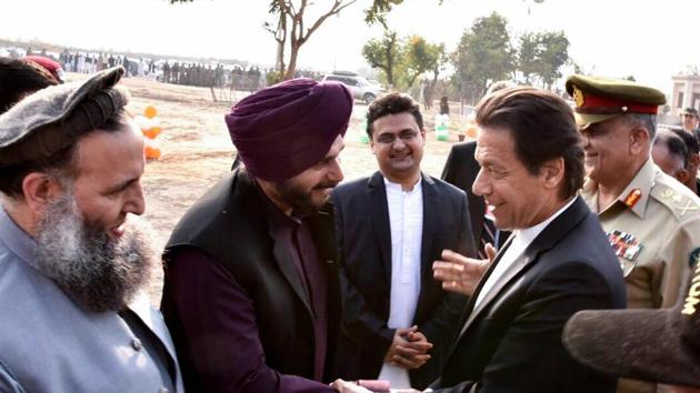 Pakistan's Prime Minister Imran Khan shakes hands with cricketer-turned politician Navjot Singh Sidhu during ground breaking ceremony for Kartarpur corridor in Pakistan's Kartarpur, November 28, 2018 (PTI) Pakistan's Prime Minister Imran Khan shakes hands with cricketer-turned politician Navjot Singh Sidhu during ground breaking ceremony for Kartarpur corridor in Pakistan's Kartarpur, November 28, 2018 (PTI)