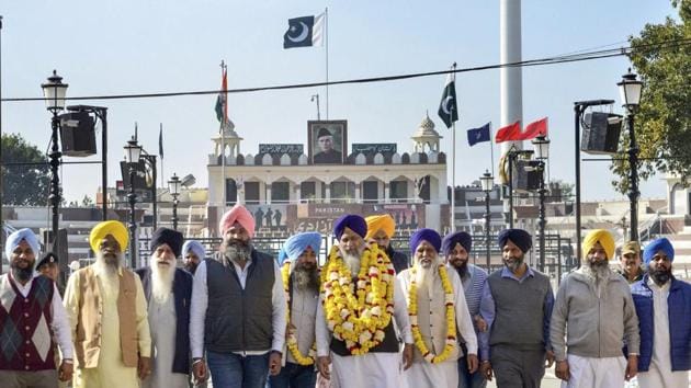 Attari: Shiromani Gurdwara Parbandhak Committee (SGPC) President Gobind Singh Longowal with SGPC members return after attending the groundbreaking ceremony for Kartarpur Corridor, at the India-Pakistan Wagah Post, about 35km from Amritsar, Friday, Nov. 30, 2018. (PTI Photo)(PTI)
