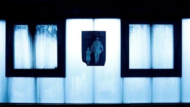 A poster with words “Daddy, be careful as if I, was there with you” hangs on a window inside the mine. The issue resonates especially with older Poles who remember deadly anti-communist protests in the early 1980s when the miners emerged as heroes. (Kacper Pempel / REUTERS) A poster with words “Daddy, be careful as if I, was there with you” hangs on a window inside the mine. The issue resonates especially with older Poles who remember deadly anti-communist protests in the early 1980s when the miners emerged as heroes. (Kacper Pempel / REUTERS)