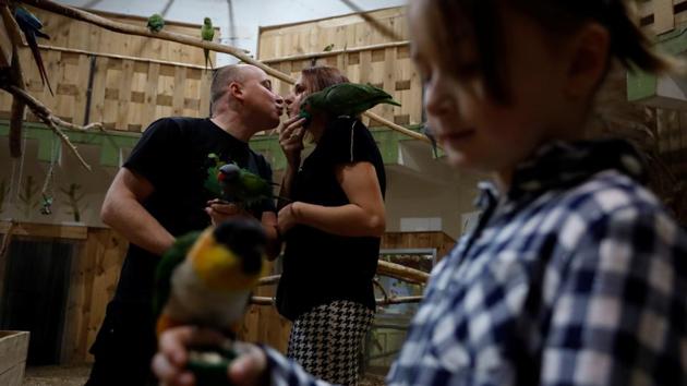 But for those with mining in the blood, moving on is harder and the smell of coal dust is as sweet as blossom. Miner Krzysztof Zawisza, 32, kisses his wife Magdalena, 31, as their daughter Zuzanna, 8, plays with a parrot during a family trip. “The atmosphere used to be much better,” Zawisza said. (Kacper Pempel / REUTERS) But for those with mining in the blood, moving on is harder and the smell of coal dust is as sweet as blossom. Miner Krzysztof Zawisza, 32, kisses his wife Magdalena, 31, as their daughter Zuzanna, 8, plays with a parrot during a family trip. “The atmosphere used to be much better,” Zawisza said. (Kacper Pempel / REUTERS)