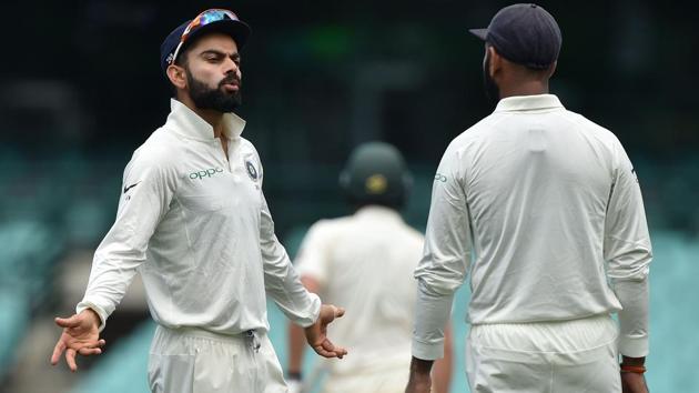 India's captain Virat Kohli (L) talks to Cheteshwar Pujara (R) whilst fielding on the third day of the tour match. (AFP) India's captain Virat Kohli (L) talks to Cheteshwar Pujara (R) whilst fielding on the third day of the tour match. (AFP)