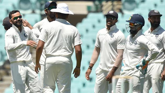 India's captain Virat Kohli (2nd-L) and the team celebrate the wicket of Australia's Harry Nielsen. (AFP) India's captain Virat Kohli (2nd-L) and the team celebrate the wicket of Australia's Harry Nielsen. (AFP)