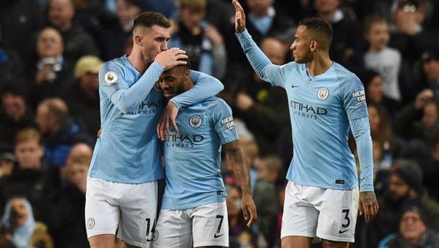 Manchester City's English midfielder Raheem Sterling (C) celebrates scoring their second goal against Bournemouth. (AFP) Manchester City's English midfielder Raheem Sterling (C) celebrates scoring their second goal against Bournemouth. (AFP)