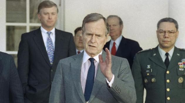 President George HW Bush talks to reporters in the Rose Garden of the White House after meeting with top military advisors to discuss the Persian Gulf War in this Feb. 11, 1991 photo.(AP File)
