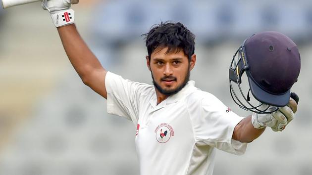 Gujarat's captain Priyank Panchal celebrates his century during a Ranji Trophy cricket match against Mumbai.(PTI)