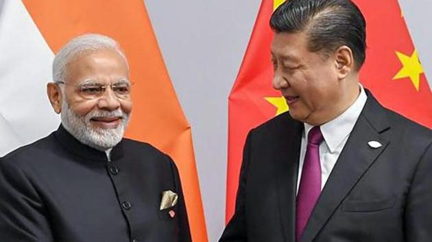 PM Narendra Modi shakes hands with Chinese President Xi Jinping on the sidelines of G-20 summit, in Buenos Aires on Friday, Nov. 30, 2018.(PTI)