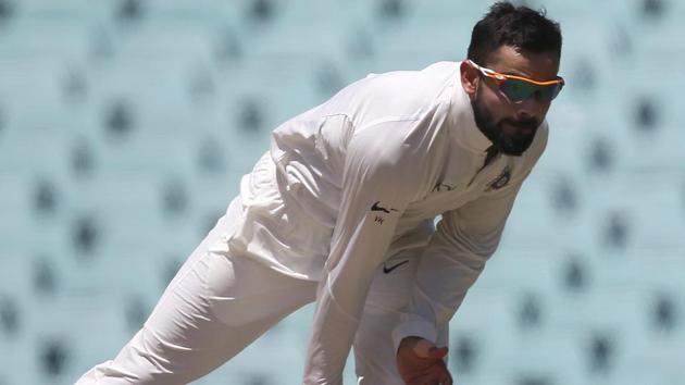 India's Virhat Kohli bowls during their tour cricket match against Cricket Australia XI in Sydney.(AP)