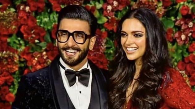 Ranveer Singh and Deepika Padukone posing for the paparazzi at their second Mumbai reception.(Instagram)