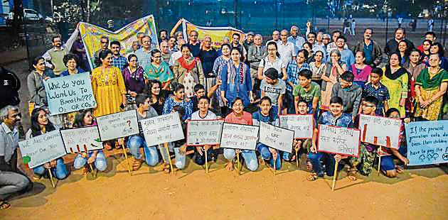 Residents protest against the proposal of road widening at Ideal colony on Sunday (Sanket Wankhade/HT PHOTO) Residents protest against the proposal of road widening at Ideal colony on Sunday (Sanket Wankhade/HT PHOTO)