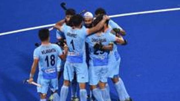 Simranjeet Singh of India celebrates with teammates after scoring during the FIH Men's Hockey World Cup Pool C match between India and South Africa at Kalinga Stadium.(Getty Images for FIH)