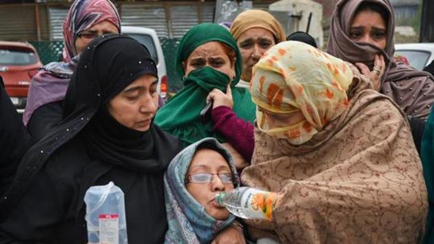 Family members and relatives of a student who went missing from an Uttar Pradesh university staging a silent protest in Srinagar. The student has returned home ( PTI File Photo)(PTI)