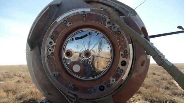 A view shows the Soyuz capsule transporting U.S. astronaut Nick Hague and Russian cosmonaut Alexei Ovchinin, after it made an emergency landing following a failure of its booster rockets, near the city of Zhezkazgan in central Kazakhstan. (REUTERS)