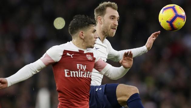 Arsenal's Lucas Torreira, left, fights for the ball with Tottenham's Christian Eriksen. (AP) Arsenal's Lucas Torreira, left, fights for the ball with Tottenham's Christian Eriksen. (AP)