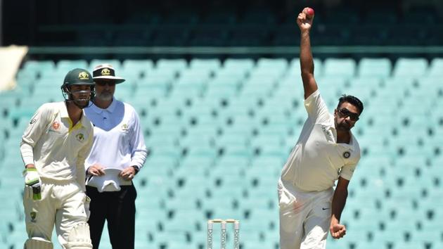 Ravi Ashwin bowls on the third day of the tour match against Cricket Australia XI at the SCG.(AFP)