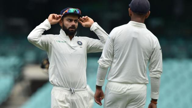 India's captain Virat Kohli (L) talks to Cheteshwar Pujara (R) whilst fielding on the third day of the tour match against Cricket Australia XI at the SCG in Sydney on November 30, 2018 (AFP) India's captain Virat Kohli (L) talks to Cheteshwar Pujara (R) whilst fielding on the third day of the tour match against Cricket Australia XI at the SCG in Sydney on November 30, 2018 (AFP)