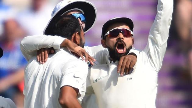 Virat Kohli (R) celebrates with teammates after England's Jonny Bairstow is bowled by India's Mohammed Shami. (AFP) Virat Kohli (R) celebrates with teammates after England's Jonny Bairstow is bowled by India's Mohammed Shami. (AFP)