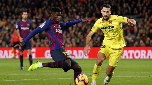 Barcelona's Ousmane Dembele shoots at goal against Villarreal on Sunday.(REUTERS)