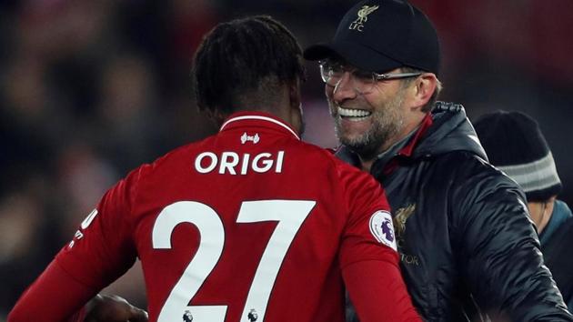 Liverpool manager Jurgen Klopp celebrates with Divock Origi at the end of the match. (Action Images via Reuters) Liverpool manager Jurgen Klopp celebrates with Divock Origi at the end of the match. (Action Images via Reuters)