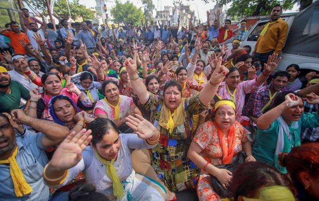 Kashmiri Pandits took out a protest march in Anantnag Sunday demanding that a passage (PTI) Kashmiri Pandits took out a protest march in Anantnag Sunday demanding that a passage (PTI)