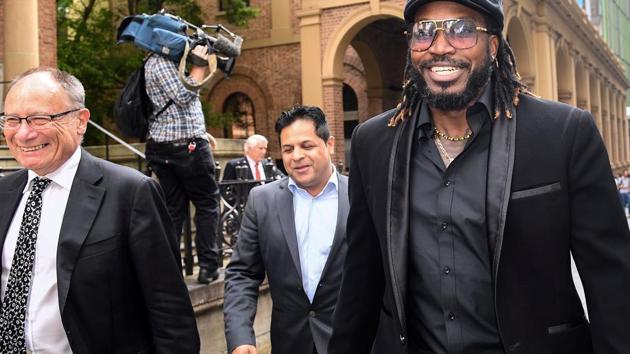 West Indies cricketer Chris Gayle reacts as he leaves the New South Wales Supreme Court after winning a defamation case against an Australian media company in Sydney.(REUTERS)