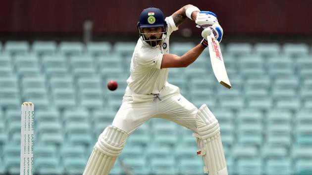 Virat Kohli plays a shot during his innings against Cricket Australia XI at the SCG.(AFP)