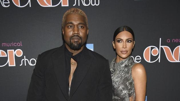 Kanye West was caught on camera as he picked up an earring from a fashion show. (Evan Agostini/Invision/AP) Kanye West was caught on camera as he picked up an earring from a fashion show. (Evan Agostini/Invision/AP)