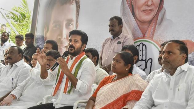 Telangana Congress working president A Revanth Reddy addresses the media in relation to the recent raid in his residence by Income Tax department, in Hyderabad.(PTI)