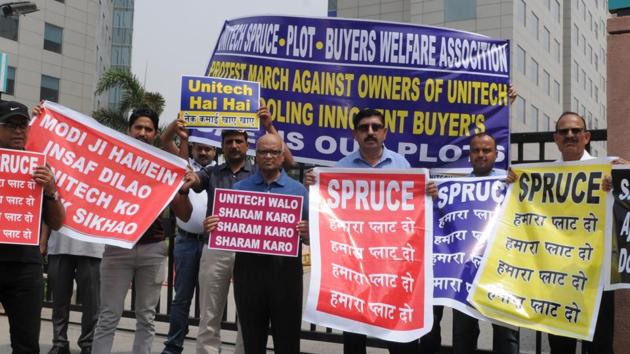 Flat buyers in many Unitech projects in NCR have been protesting against delayed possession deadlines.(HT File)