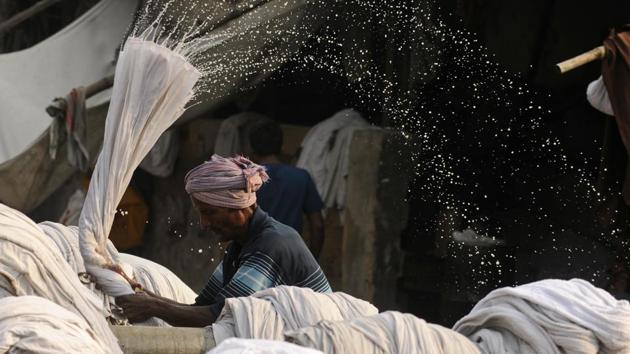 A workday starts as early as 4 am and lasts as long as there are clothes to wash, dry and iron, even if until midnight. The sound of clothes being battered against stone is a constant. As many as 200 articles pass a washerman’s hands daily, netting a monthly income of around Rs 25,000. (Samir Jana / HT Photo) A workday starts as early as 4 am and lasts as long as there are clothes to wash, dry and iron, even if until midnight. The sound of clothes being battered against stone is a constant. As many as 200 articles pass a washerman’s hands daily, netting a monthly income of around Rs 25,000. (Samir Jana / HT Photo)