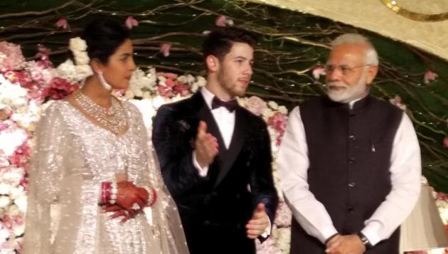 Prime Minister Narendra Modi with actor Priyanka Chopra and Nick Jonas at their wedding reception in New Delhi on Dec 4, 2018.(IANS)