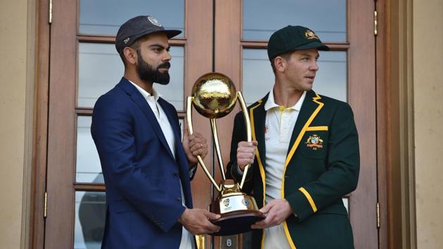 India skipper Virat Kohli (left) and Australia captain Tim Paine pose with the Border Gavaskar trophy. (AFP) India skipper Virat Kohli (left) and Australia captain Tim Paine pose with the Border Gavaskar trophy. (AFP)