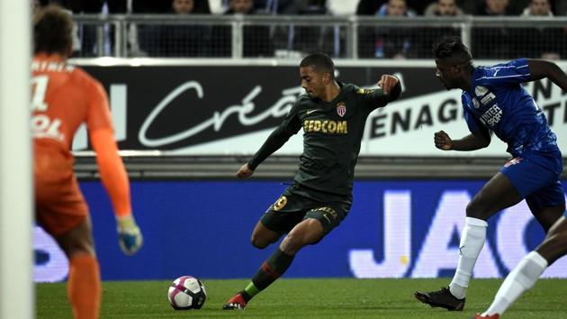 Monaco's Colombian forward Radamel Falcao (centre) kicks the ball past Amiens' Beninese defender Khaled Adenon.(AFP)