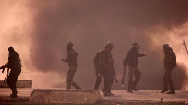 Smoke billows during clashes between protesters and security forces in south Kashmir's Shopian district.(REUTERS FILE PHOTO)