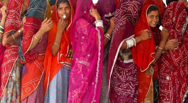 Women wait in a queue to cast their votes at a polling station in Ajmer district, Rajasthan. (Reuters) Women wait in a queue to cast their votes at a polling station in Ajmer district, Rajasthan. (Reuters)