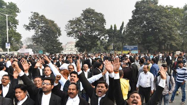Patna: Patna High Court lawyers demonstrate outside the court after the murder of a senior advocate in Patna, Wednesday, Dec. 5, 2018. (PTI Photo) (PTI12_5_2018_000073A) (PTI) Patna: Patna High Court lawyers demonstrate outside the court after the murder of a senior advocate in Patna, Wednesday, Dec. 5, 2018. (PTI Photo) (PTI12_5_2018_000073A) (PTI)