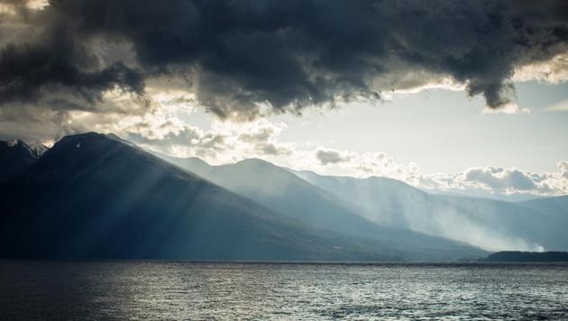 A 35-minute ferry ride across the impossibly clear glacial waters of British Columbia’s Kootenay Lake in Canada, brings one to the East Shore. For generations, lush tracts of marijuana have flourished here along the abandoned logging roads that snake through its craggy mountains. (Ben Nelms / Bloomberg) A 35-minute ferry ride across the impossibly clear glacial waters of British Columbia’s Kootenay Lake in Canada, brings one to the East Shore. For generations, lush tracts of marijuana have flourished here along the abandoned logging roads that snake through its craggy mountains. (Ben Nelms / Bloomberg)