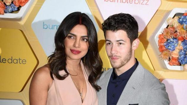 630px x 354px - Priyanka Chopra, Nick Jonas can't keep their eyes off each other as they  attend party for app launch. See pics | Bollywood - Hindustan Times