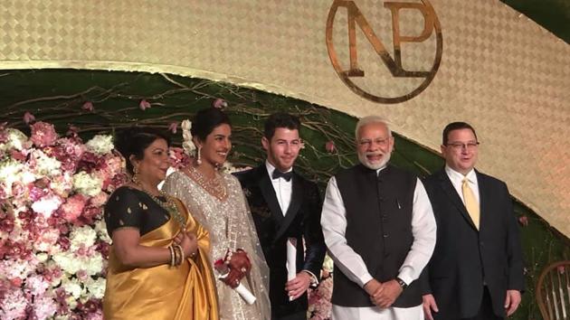 Prime Minister Narendra Modi with Priyanka Chopra and Nick Jonas at their wedding reception. (HT Photo) Prime Minister Narendra Modi with Priyanka Chopra and Nick Jonas at their wedding reception. (HT Photo)