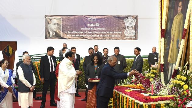 President Ram Nath Kovind, Vice President M. Venkaiah Naidu and Prime Minister Narendra Modi on Thursday paid floral tributes to Babasaheb B.R. Ambedkar, on his 63rd death anniversary at a function in Parliament House Lawns, New Delhi. Lok Sabha Speaker Sumitra Mahajan, other MPs and political leaders, also paid homage to the Father of the Indian Constitution, who championed the causes of Dalits, women and labourers. (Arvind Yadav / HT Photo) President Ram Nath Kovind, Vice President M. Venkaiah Naidu and Prime Minister Narendra Modi on Thursday paid floral tributes to Babasaheb B.R. Ambedkar, on his 63rd death anniversary at a function in Parliament House Lawns, New Delhi. Lok Sabha Speaker Sumitra Mahajan, other MPs and political leaders, also paid homage to the Father of the Indian Constitution, who championed the causes of Dalits, women and labourers. (Arvind Yadav / HT Photo)