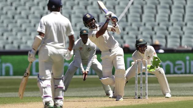 India's Ajinkya Rahane watches as he hits the ball during the first Test between Australia and India in Adelaide. (AP) 