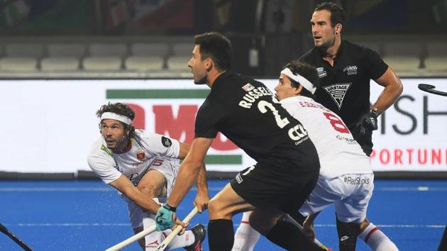 Spain's Vicenc Ruiz (2L) fights for the ball with New Zealand's Shea McAleese during the field hockey group stage match between Spain and New Zealand at the 2018 Hockey World Cup in Bhubaneswar on December 6, 2018 (AFP) Spain's Vicenc Ruiz (2L) fights for the ball with New Zealand's Shea McAleese during the field hockey group stage match between Spain and New Zealand at the 2018 Hockey World Cup in Bhubaneswar on December 6, 2018 (AFP)