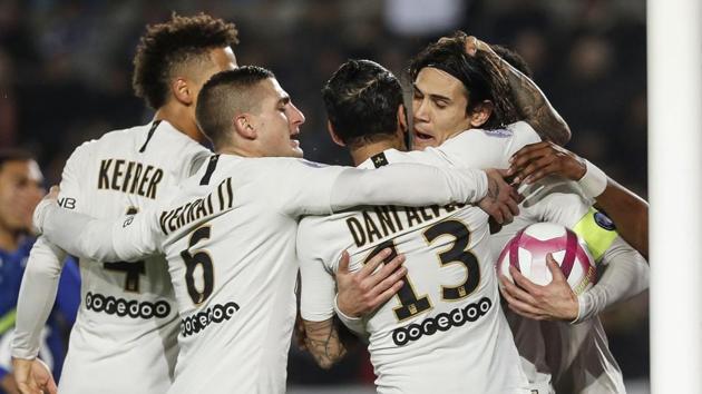 PSG's Edinson Cavani, right, celebrates with teammate after scoring a goal during the League One soccer match between Strasbourg and Paris Saint Germain at the Stade de la Meinau stadium in Strasbourg. (AP) PSG's Edinson Cavani, right, celebrates with teammate after scoring a goal during the League One soccer match between Strasbourg and Paris Saint Germain at the Stade de la Meinau stadium in Strasbourg. (AP)