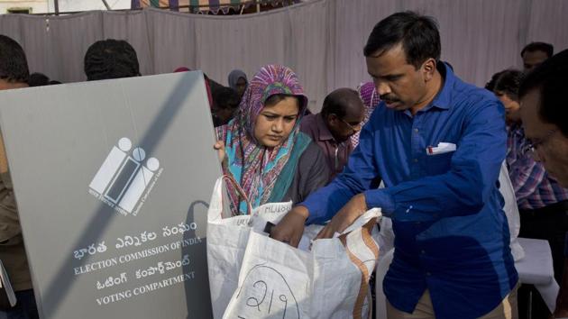 Indian polling officers check their election material before leaving for their assigned polling stations in Hyderabad, India, Thursday, Dec.6, 2018. Telangana assembly elections will be held on December 7.(AP)