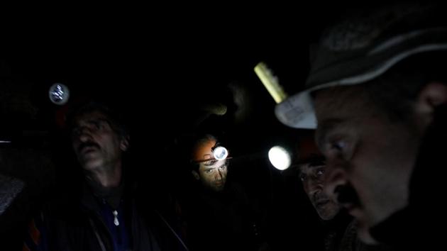 Miners in the Mindeli mine. After a protest in Tkibuli two years ago miners won some improvement in working conditions and a small pay rise. But, in general, little changes, the protest mood fades and miners go back down the pit again. A few see it as an automatic continuation of a family tradition. (David Mdzinarishvili / REUTERS)