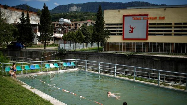 School children can head for the local stadium or pool after school is over or join in folk dancing classes. But for teenagers or those who are older, there is a sad dearth of night clubs or internet cafes. Mining was developed in Tkibuli in the 19th century and the town became the centre of Georgia’s coal mining industry in Soviet times. (David Mdzinarishvili / REUTERS)