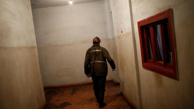 A miner walks to enter the Mindeli mine. Miners were an elite class of worker in Soviet times. They had good salaries and perks and dictator Josef Stalin even spared them the draft during the war. Infrastructure sprang up around the mines. (David Mdzinarishvili / REUTERS)